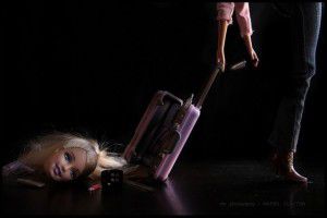 Barbie head in suitcase