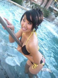Asian Girl with Black Bikini at the Pool
